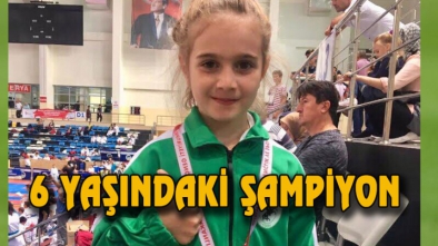 6 YAŞINDAKİ NİSANUR GÜMÜŞ MADALYAYLA TAKDİR TOPLADI